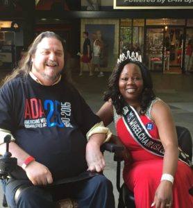Mrs. Wheelchair International, Yvette Peguese, pictured with wheelchair user, Rusty Taylor.