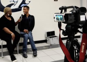 SHOWAbility Board Chair Twanda Black interviews Mr. MiraKool (Comedian and motivational speaker with cerebral palsy) at the Disability Awareness Career Day.