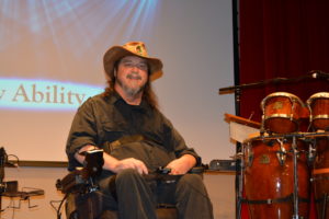 Rusty Taylor, Jazz singer and wheelchair user poses for photo.