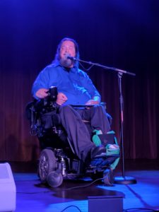 Rusty Taylor, wheelchair user, sings Jazz.