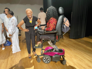 Myrna Clayton laughing with Yvette Pegues
